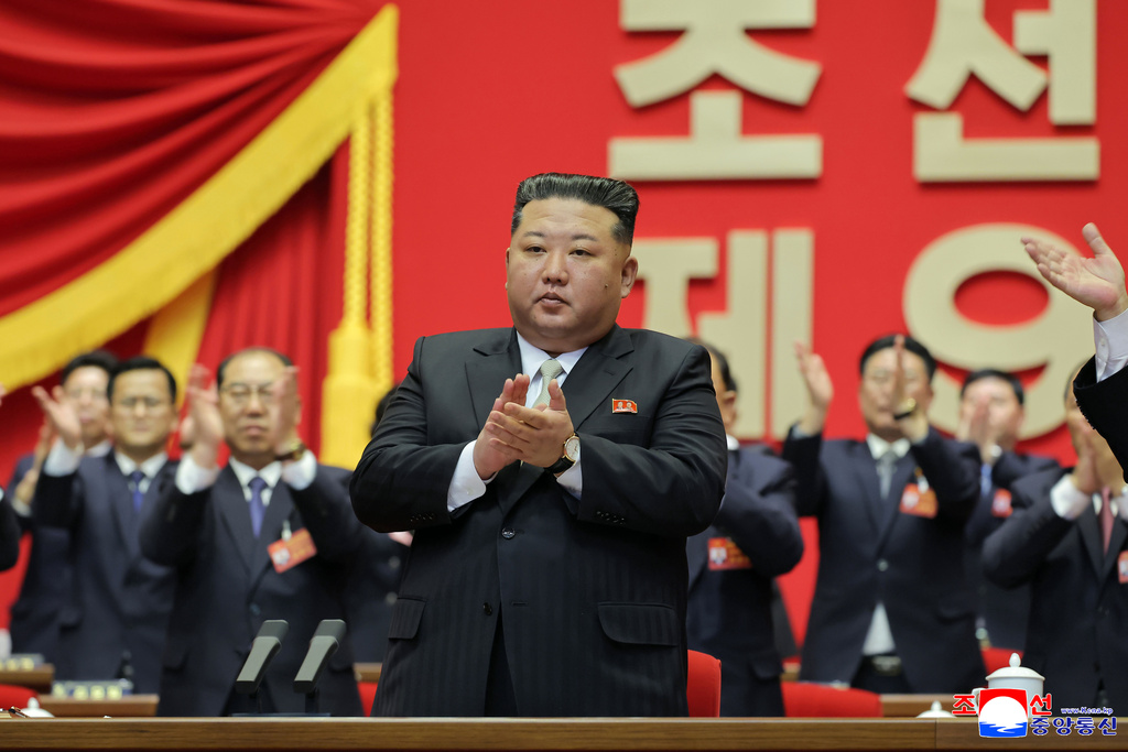FILE - This photo provided by the North Korean government, its leader Kim Jong Un, center, claps hands as he was re-elected to the top post of the ruling Workers' Party, during the party's Congress in Pyongyang, on Feb. 22, 2026. Independent journalists were not given access to cover the event depicted in this image distributed by the North Korean government. The content of this image is as provided and cannot be independently verified. Korean language watermark on image as provided by source reads: "KCNA" which is the abbreviation for Korean Central News Agency. (Korean Central News Agency/Korea News Service via AP, File)