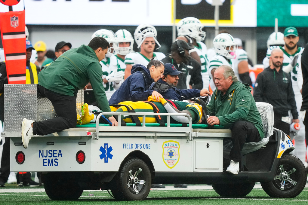 Green Bay Packers wide receiver Jayden Reed (11) is taken off the field following an injury during an NFL football game againt the New York Jets in East Rutherford, N.J., Sunday, Sept. 20, 2026. (AP Photo/Yuki Iwamura)