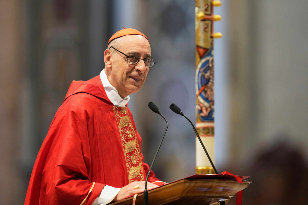 FILE -Cardinal Victor Manuel Fernandez delivers his speech during a mass on the sixth of nine days of mourning for late Pope Francis, in St. Peter's Basilica at the Vatican, May 1, 2025. (AP Photo/Gregorio Borgia, File)