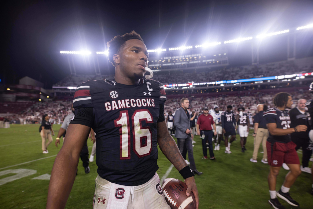 FILE - South Carolina quarterback LaNorris Sellers (16) celebrates after defeating Kentucky in an NCAA college football game, Sept. 27, 2025, in Columbia, S.C. (AP Photo/Scott Kinser, File)