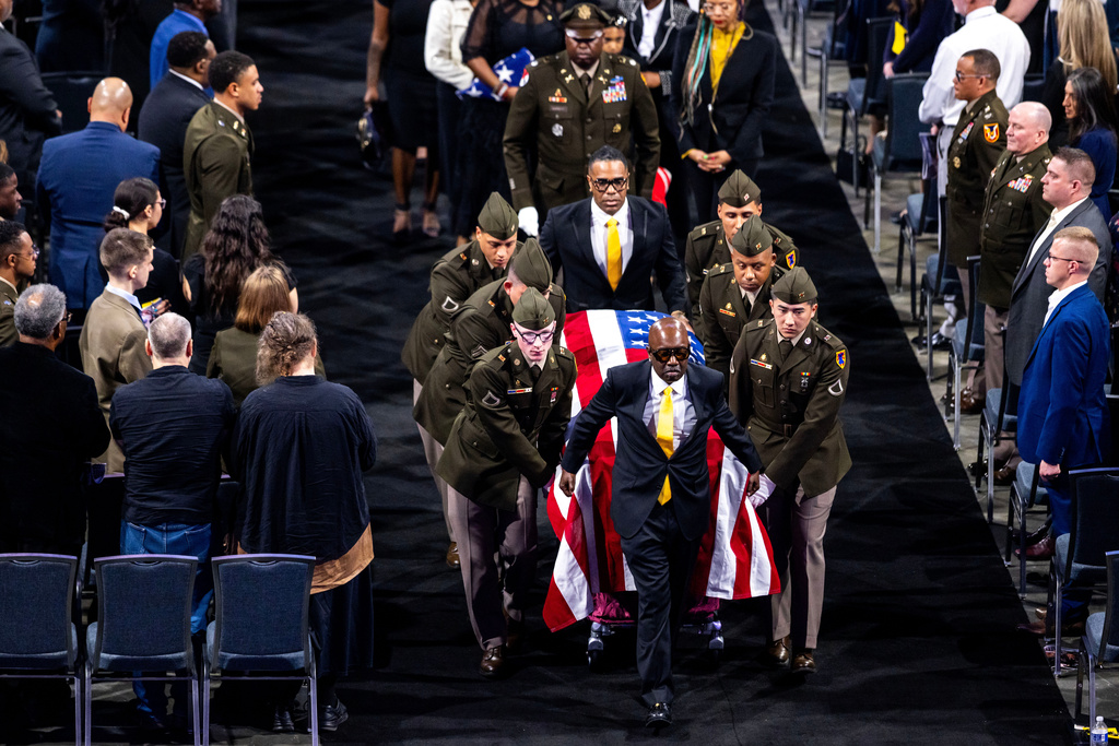 FILE - The body of Lt. Col. Brandon Shah is carried out of his funeral service at Old Dominion University in Norfolk, Va., March 22, 2026. (Kendall Warner/The Virginian-Pilot via AP, File)