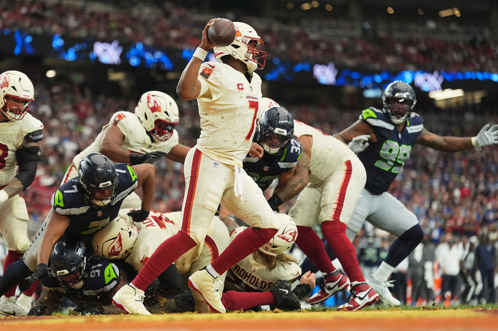 Arizona Cardinals quarterback Jacoby Brissett looks to throw against the Seattle Seahawks during the first half of an NFL football game in Glendale, Ariz., Sunday, Sept. 20, 2026. (AP Photo/Ross D. Franklin)