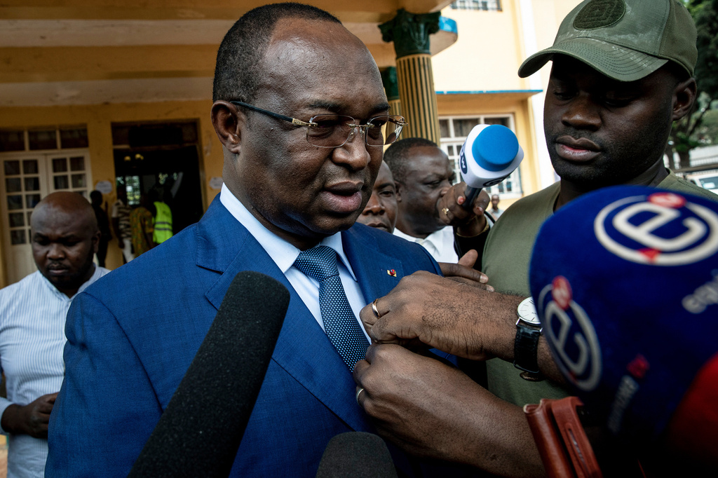 FILE - Presidential challenger Anicet-Georges Dologuele speaks to the media after casting his vote at the town hall polling station in the capital Bangui, Central African Republic, Dec. 27, 2020. (AP Photo, File)