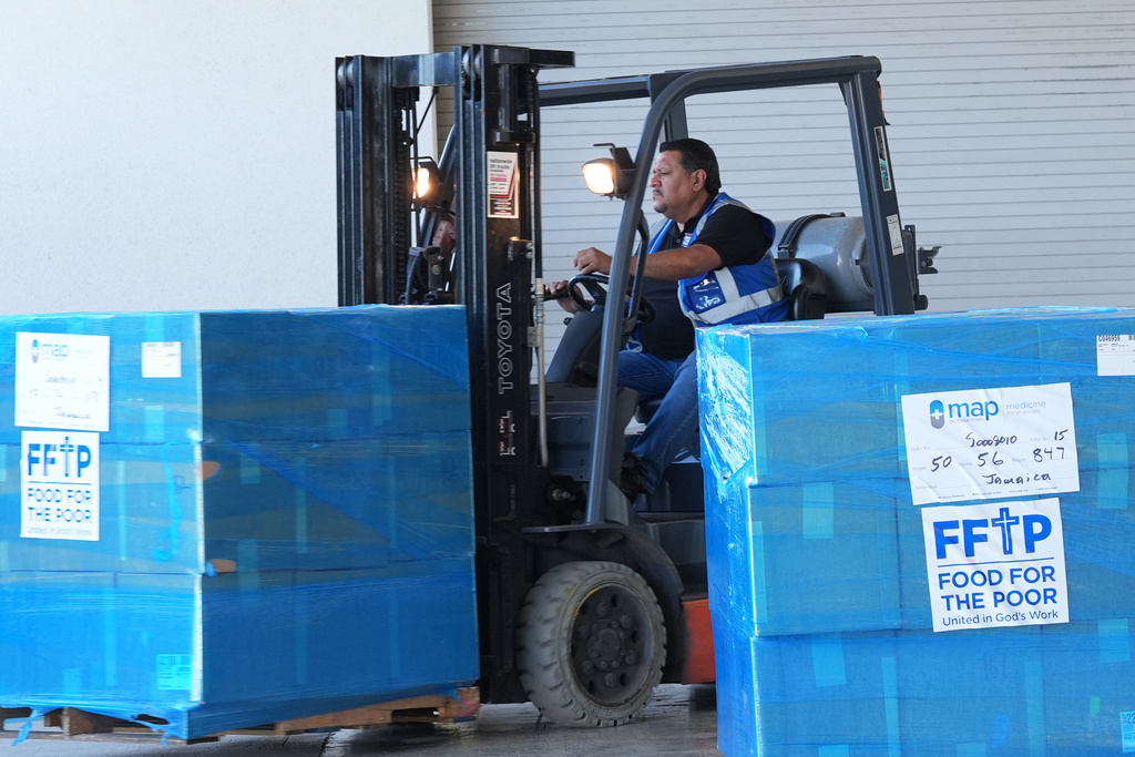 Emergency supplies are loaded on a semi truck bound for Jamaica, Thursday, Oct. 30, 2025, at Food for the Poor in Coconut Creek, Fla. (AP Photo/Marta Lavandier)