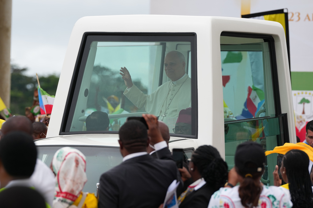 Pope Leo XIV arrives at the Basilica of the Immaculate Conception on the 10th day of his 11-day pastoral visit to Africa in Mongomo, Equatorial Guinea, Wednesday, April 22, 2026. (AP Photo/Misper Apawu)