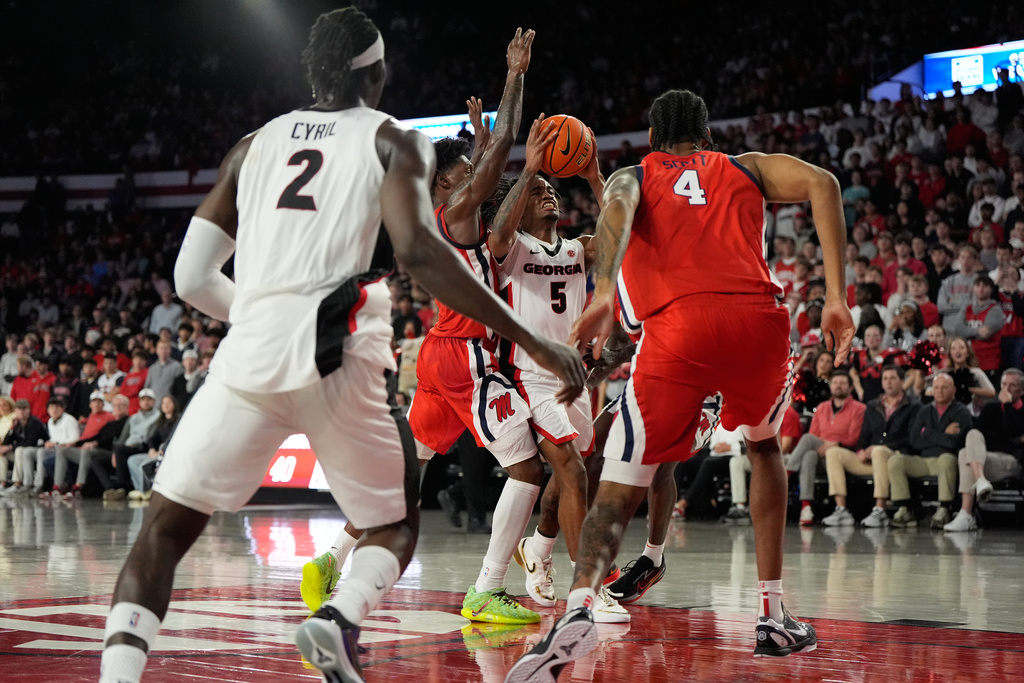 Georgia guard Jeremiah Wilkinson (5) looks to shoot the ball in the first half during an NCAA college basketball game against Mississippi, Wednesday, Jan. 14, 2026, in Athens, Ga. (AP Photo/Brynn Anderson)