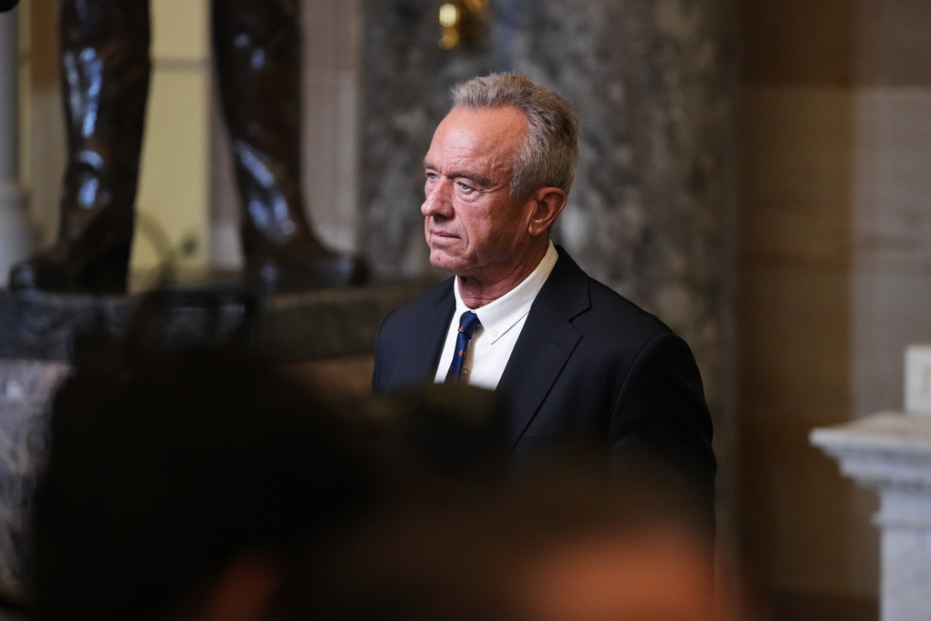 Health and Human Services Secretary Robert F. Kennedy Jr. is seen following President Donald Trump's State of the Union address to a joint session of Congress in the House chamber at the U.S. Capitol in Washington, Tuesday, Feb. 24, 2026. (AP Photo/Allison Robbert)
