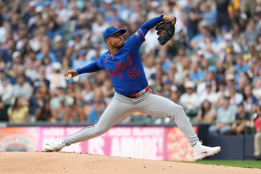 New York Mets' Freddy Peralta pitches during the first inning of a baseball game against the Milwaukee Brewers, Monday, July 20, 2026, in Milwaukee. (AP Photo/Aaron Gash)