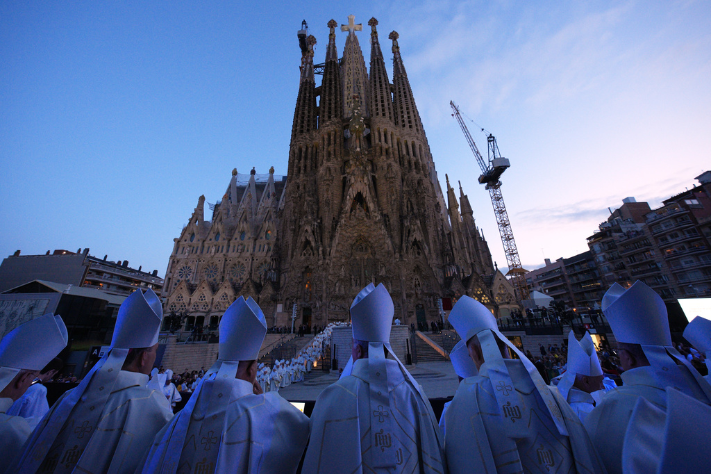 Clergy attend the inauguration of the Tower of Jesus Christ at the Basilica of the Sagrada FamÌlia in Barcelona, Spain, Wednesday, June 10, 2026. CORRECTS FROM PRIESTS TO CLERGY (AP Photo/Emilio Morenatti)