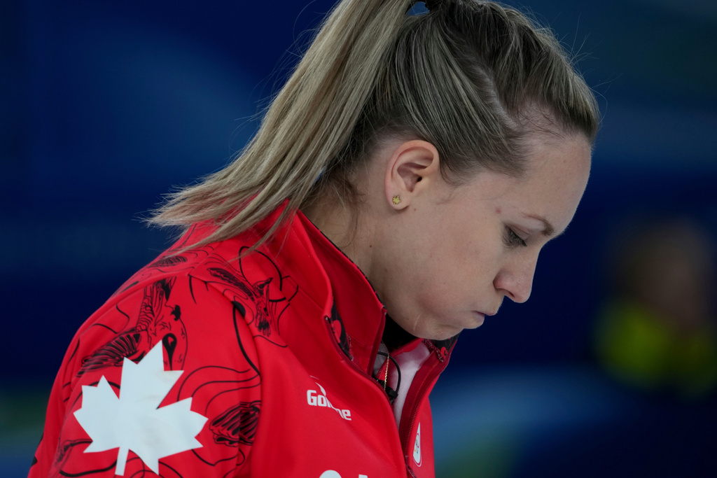 Canada's Rachel Homan reacts during a women's curling semifinal match against Sweden, at the 2026 Winter Olympics, in Cortina d'Ampezzo, Italy, Friday, Feb. 20, 2026. (AP Photo/Misper Apawu)