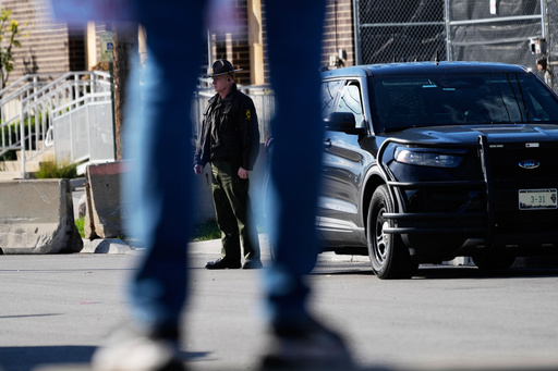 A Illinois State Police officer stands outside an ICE (U.S. Immigration and Customs Enforcement) processing facility in the Chicago suburb of Broadview, Ill., Tuesday, Oct. 21, 2025. (AP Photo/Nam Y. Huh) A Illinois State Police officer stands outside an ICE (U.S. Immigration and Customs Enforcement) processing facility in the Chicago suburb of Broadview, Ill., Tuesday, Oct. 21, 2025. (AP Photo/Nam Y. Huh)