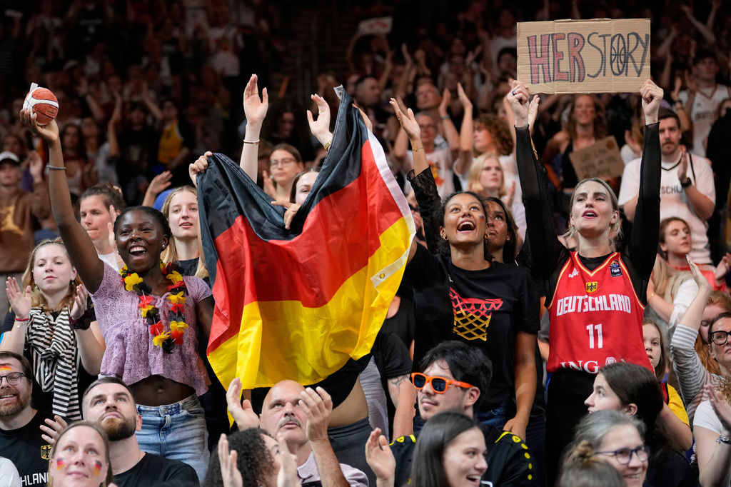 German fans cheer during the Women's Basketball World Cup semifinal match between France and Germany in Berlin, Saturday, Sept. 12, 2026. (AP Photo/Ebrahim Noroozi)