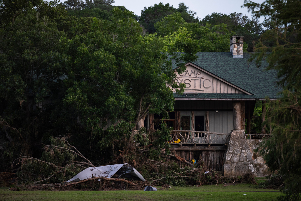 FILE-Debris covers the area of Camp Mystic in Hunt, Texas, Monday, July 7, 2025, after a flash flood swept through the area. (AP Photo/Eli Hartman, File)
