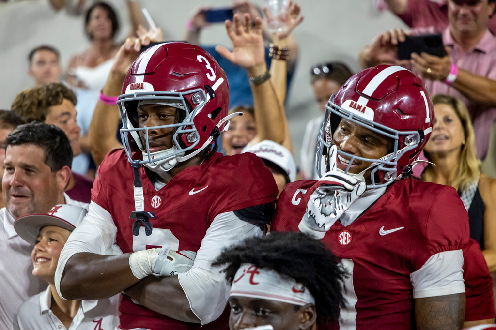 Alabama wide receiver Lotzeir Brooks (3) and Alabama wide receiver Ryan Coleman-Williams (1) celebrate with fans after an NCAA college football game Saturday, Sept. 19, 2026, in Tuscaloosa, Ala. (AP Photo/Vasha Hunt)