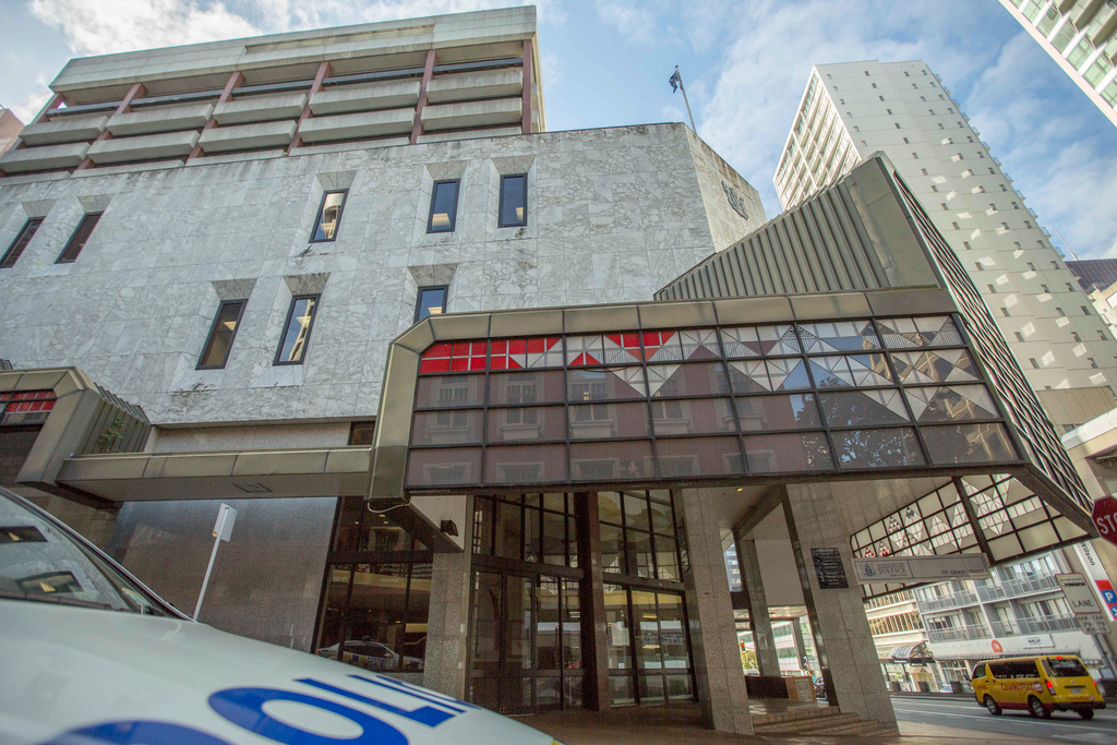 A police car is parked outside the Auckland District Court in Auckland, New Zealand, Aug. 17, 2015. (Bevan Read/Fairfax NZ/STUFF via AP)