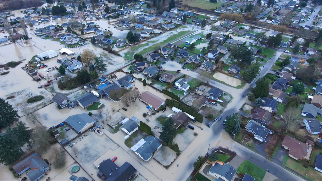 This image made from a video provided by the Pacific Police Department shows homes underwater, Tuesday, Dec. 16, 2025, in Pacific, Wash. (Pacific Police Department via AP)