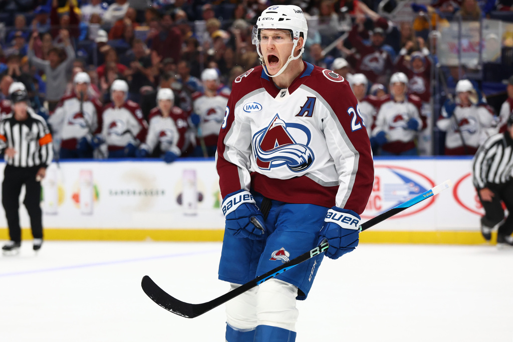 Colorado Avalanche center Nathan MacKinnon (29) celebrates his goal during the second period of an NHL hockey game against the Buffalo Sabres Monday, Oct. 13, 2025, in Buffalo, N.Y. (AP Photo/Jeffrey T. Barnes)