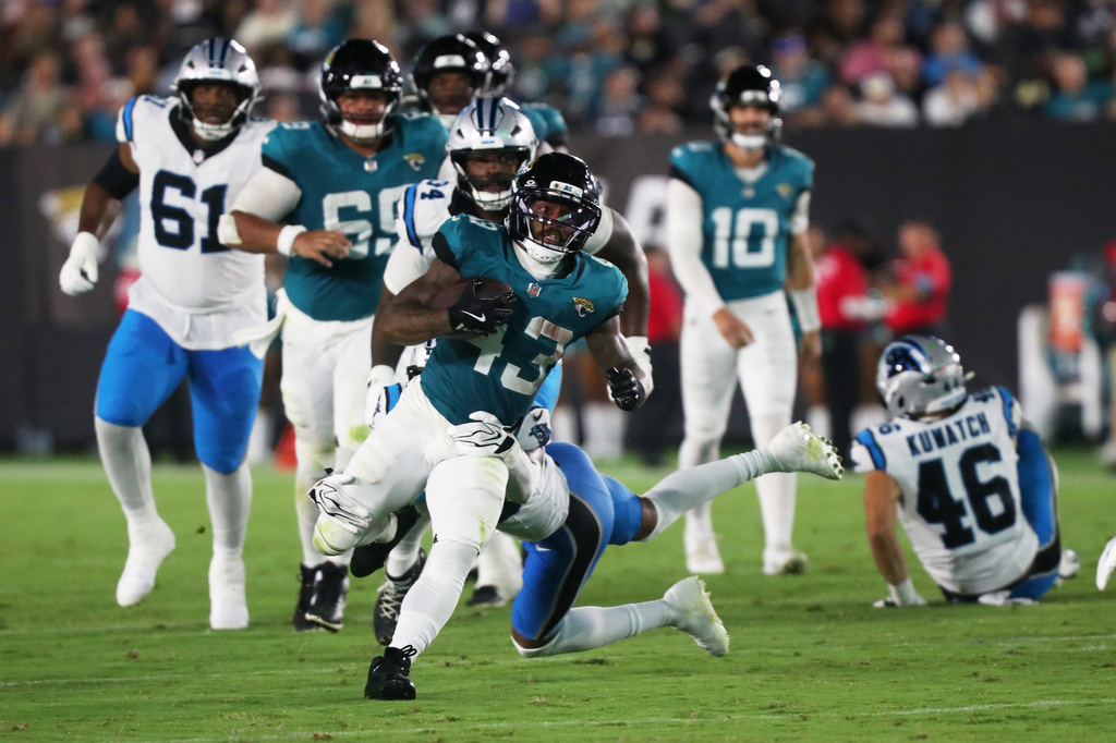 Jacksonville Jaguars running back Ameer Abdullah runs against the Carolina Panthers during the first half of an NFL preseason football game, Friday, Aug. 21, 2026, in Jacksonville, Fla. (AP Photo/Kelly Jordan)