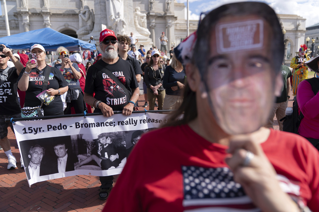 Demonstrators protest against President Donald Trump's use of federal law enforcement and National Guard troops in the city during a rally at Union Station, Tuesday, Sept. 2, 2025, in Washington. (AP Photo/Jose Luis Magana)