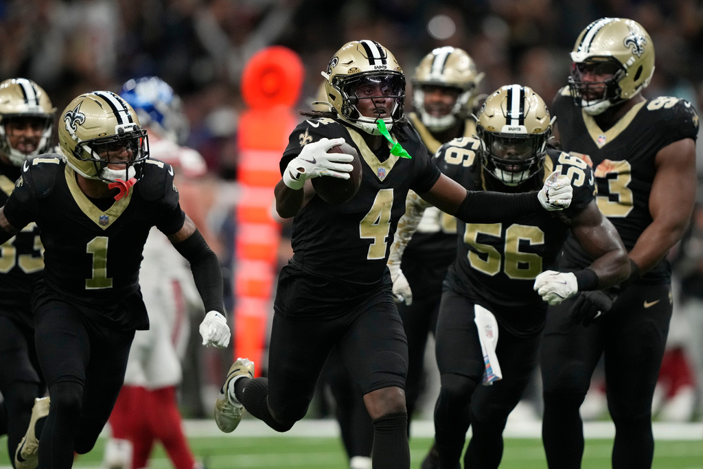 New Orleans Saints cornerback Kool-Aid McKinstry (4) celebrates his interception against the New York Giants in the second half of an NFL football game, Sunday, Oct. 5, 2025, in New Orleans. (AP Photo/Gerald Herbert)