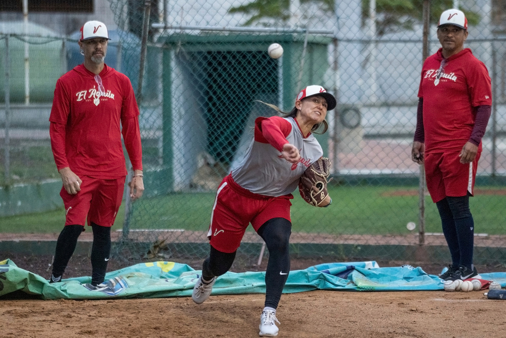 FILE - Player Kelsie Whitmore throws a ball during a training session with the Aguila de Veracruz professional baseball team in Veracruz, Mexico, April 8, 2025. (AP Photo/Victoria Razo, File)