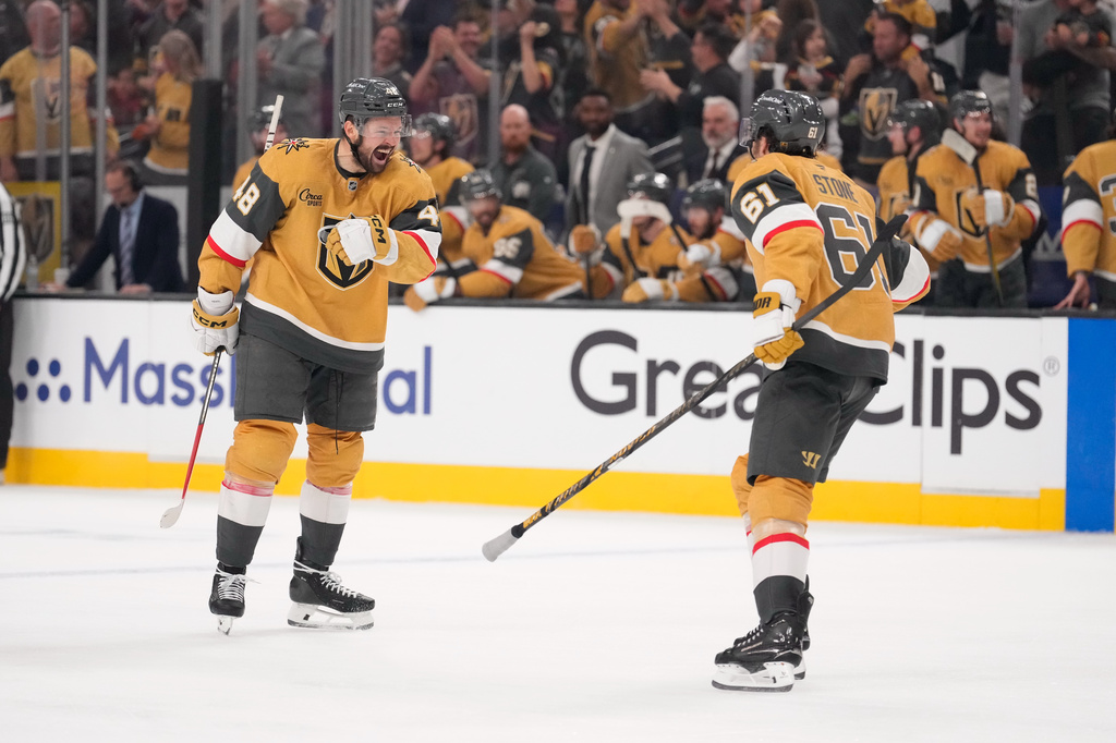 Vegas Golden Knights center Tomas Hertl, left, celebrates his goal with right wing Mark Stone during the third period in Game 3 of the Western Conference finals NHL hockey Stanley Cup playoff series against the Colorado Avalanche, Sunday, May 24, 2026, in Las Vegas. (AP Photo/Mark J. Terrill)