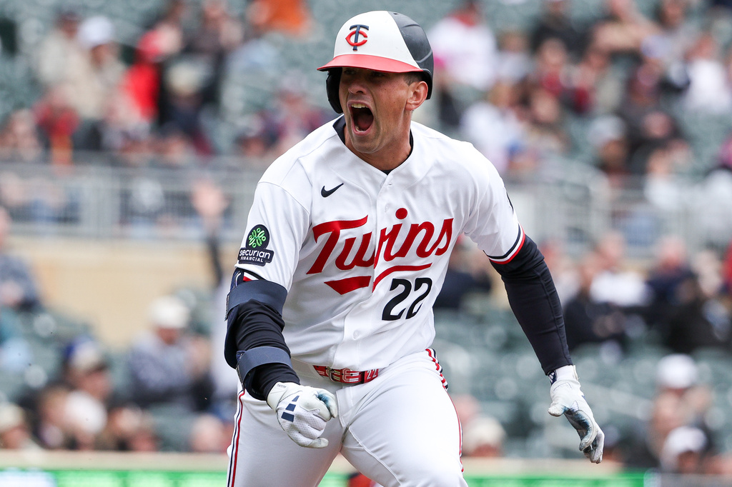 Minnesota Twins' Brooks Lee celebrates a two-run single against the Detroit Tigers during the eighth inning of baseball game, Thursday, April 9, 2026, in Minneapolis. (AP Photo/Matt Krohn)