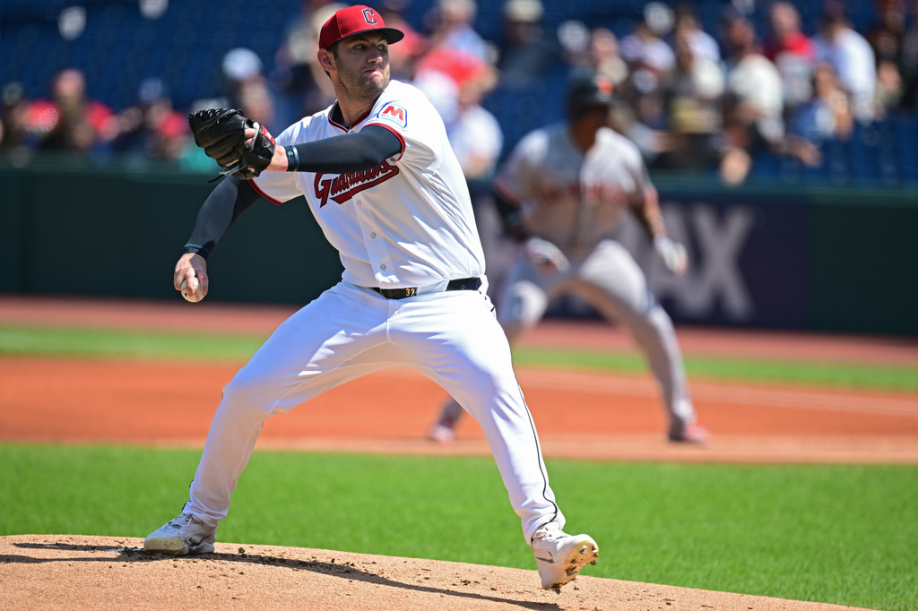 Cleveland Guardians starting pitcher Gavin Williams delivers during the first inning of a baseball game against the San Francisco Giants, Thursday, Aug. 20, 2026, in Cleveland. (AP Photo/David Dermer)