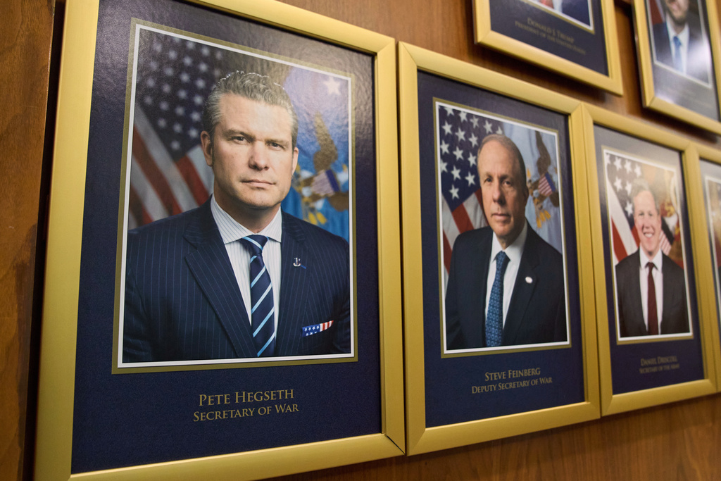 FILE - Department leadership portraits are displayed in the Pentagon after President Donald Trump signed an executive order aiming to rename the Department of Defense the Department of War in Washington, Sept. 9, 2025. (AP Photo/Jacquelyn Martin, File)