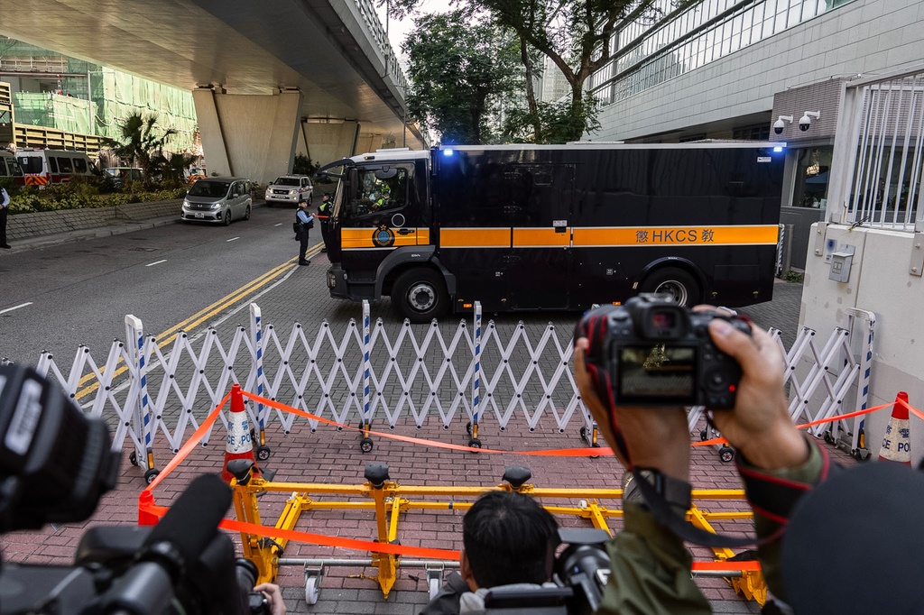 A Correctional Services Department vehicle believed to be prepared to carry Jimmy Lai leaves the West Kowloon Magistrates' Courts following the verdict for Hong Kong activist publisher Jimmy Lai's national security trial in Hong Kong, Monday, Dec. 15, 2025. (AP Photo/Chan Long Hei)