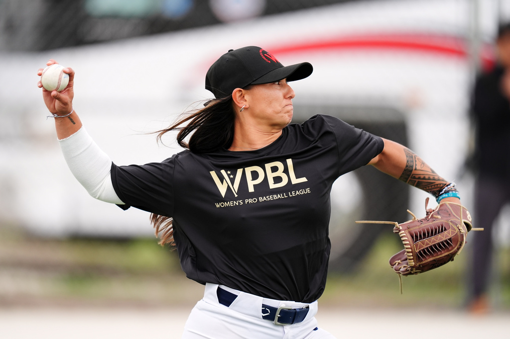 FILE - Kelsie Whitmore pitches during a Women's Pro Baseball League practice, Wednesday, March 18, 2026, in Fort Myers, Fla. (AP Photo/Rebecca Blackwell, File)
