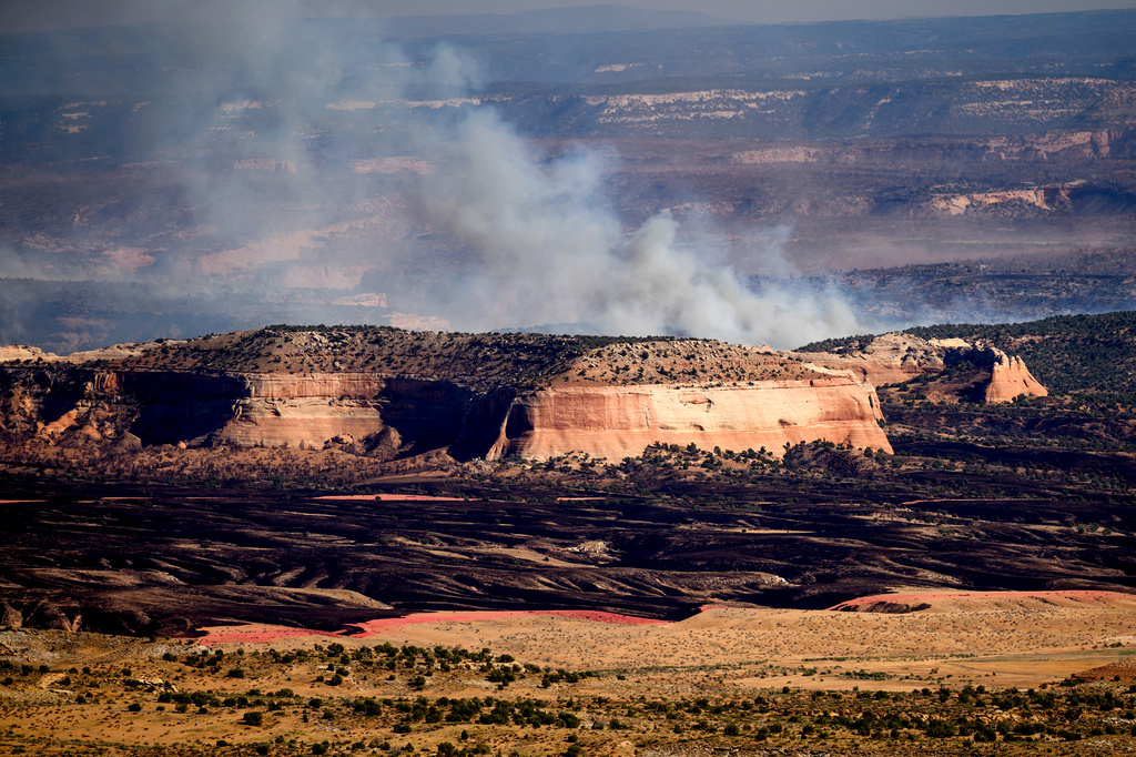 The Snyder Fire burns near Thompson Springs, Utah, on Sunday, June 28, 2026. (AP Photo/Noah Berger)