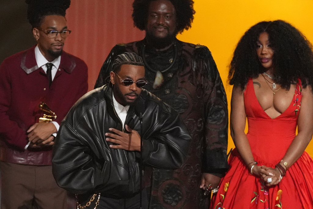 Ruchaun Akers, from left, Sounwave, Kamasi Washington, and SZA accept the award for record of the year for "Luther" during the 68th annual Grammy Awards on Sunday, Feb. 1, 2026, in Los Angeles. (AP Photo/Chris Pizzello)