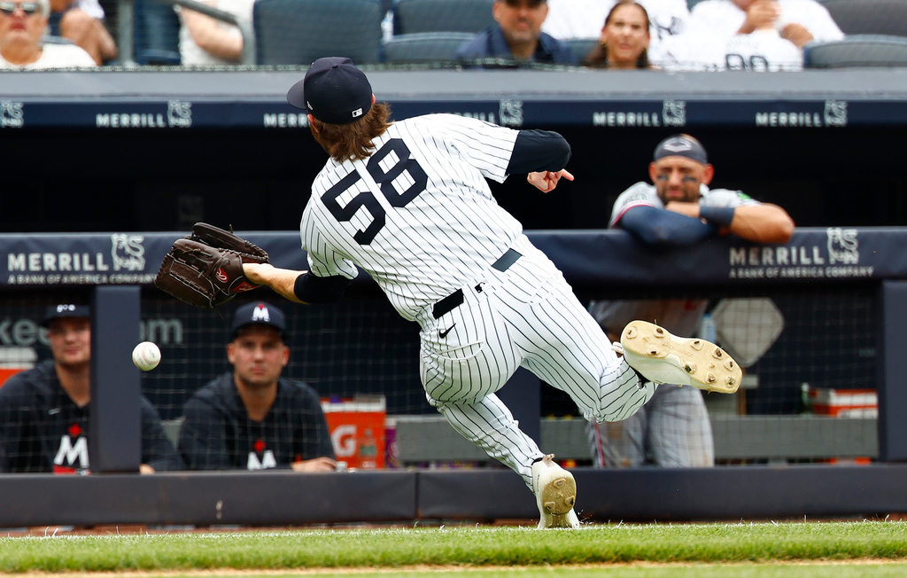 New York Yankees pitcher Paul Blackburn (58) misses a ball hit into foul territory by Minnesota Twins' Kyler Fedko during the fifth inning of a baseball game, Sunday, July 5, 2026, in New York. (AP Photo/Noah K. Murray)