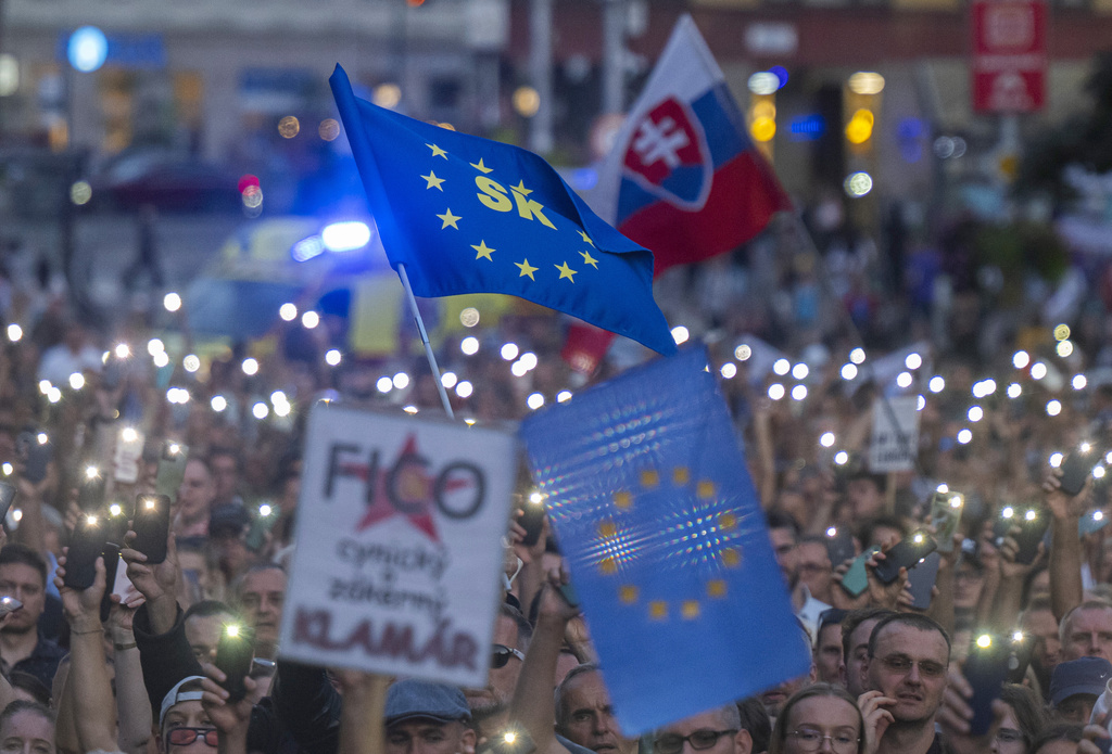 Protesters gather during a demonstration in Bratislava, Slovakia, Thursday, Sept. 11, 2025. (Martin Baumann/TASR via AP)