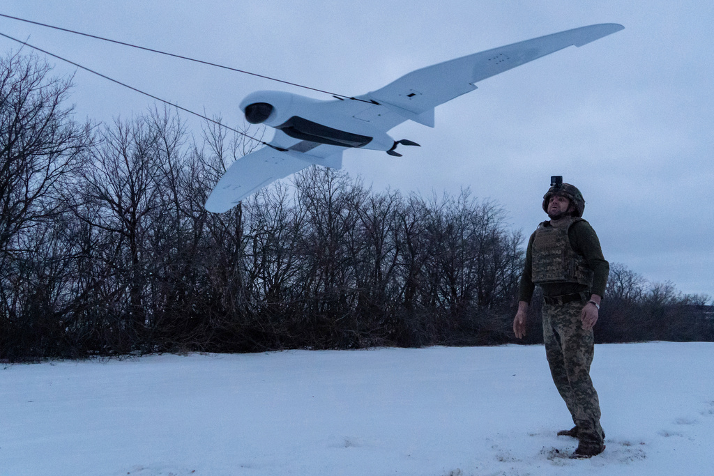 A Ukrainian soldier of the 48th separate brigade launches a reconnaissance drone in Kharkiv region, Ukraine, Wednesday, March 4, 2026. (AP Photo/Andrii Marienko)