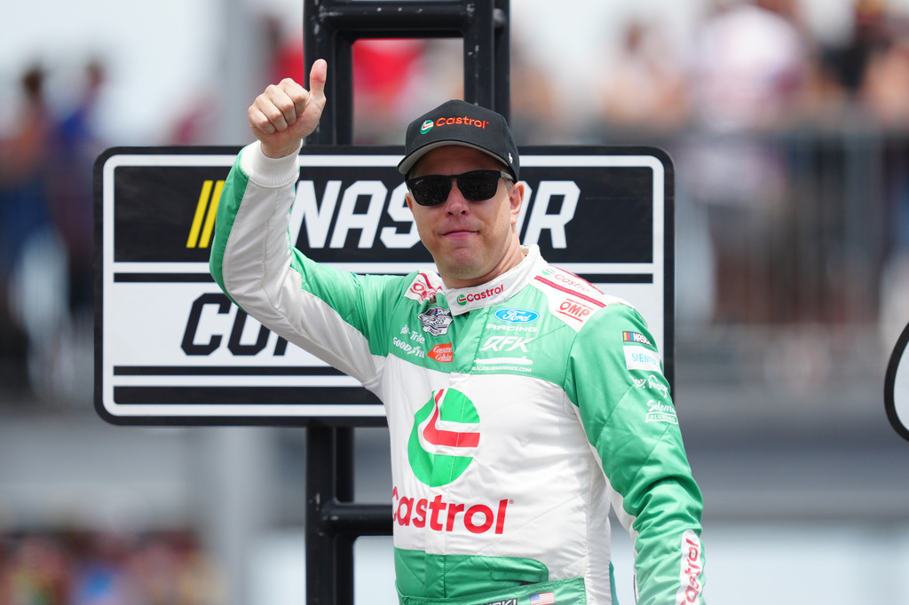 FILE - Driver Brad Keselowski gives a thumbs up at the NASCAR Cup Series auto race at Pocono Raceway, Sunday, June 14, 2026, in Long Pond, Pa. (AP Photo/Derik Hamilton, File)