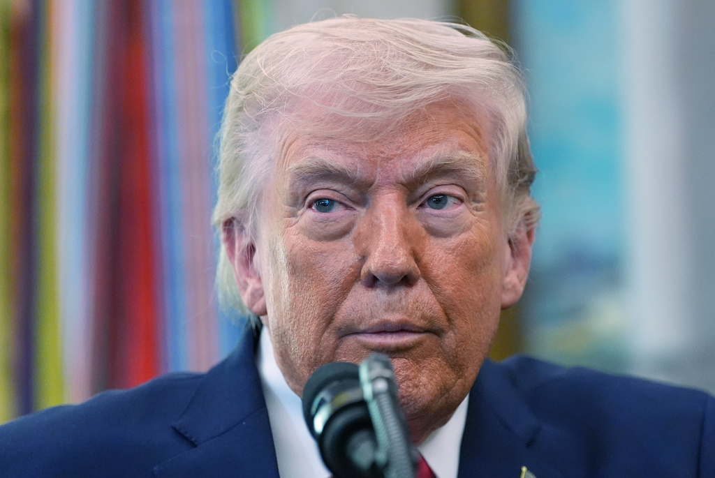 President Donald Trump speaks during the swearing in for Homeland Security Secretary Markwayne Mullin in the Oval Office of the White House, Tuesday, March 24, 2026, in Washington. (AP Photo/Alex Brandon)