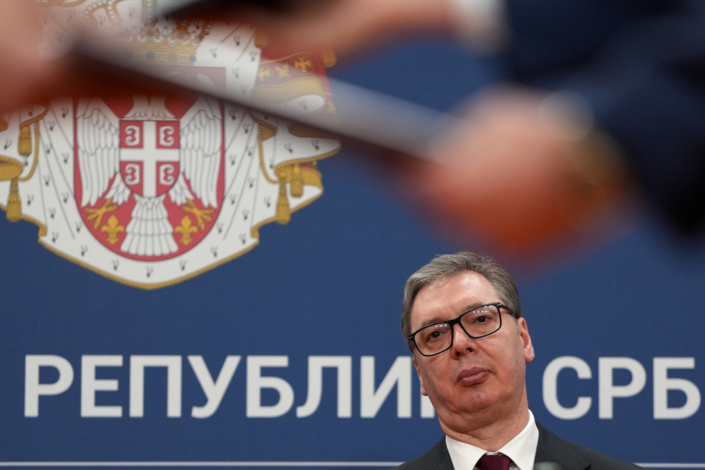 FILE - Serbian President Aleksandar Vucic looks on as documents are exchanged after the signing of an agreement following talks with Azerbaijan President Ilham Aliyev at the Serbia Palace in Belgrade, Serbia, Feb. 15, 2026. (AP Photo/Darko Vojinovic, File)