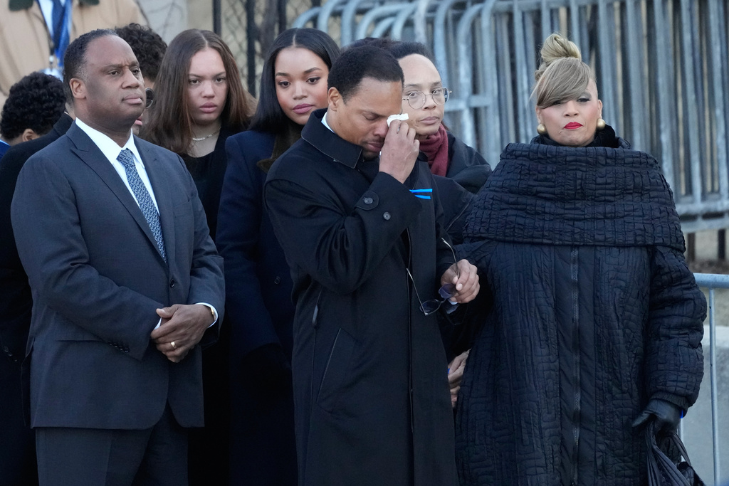 The family of Reverend Jesse Jackson arrives as Yusep Jackson wipes his eyes before public visitation at Rainbow/PUSH Coalition in Chicago, Thursday, Feb. 26, 2026. (AP Photo/Nam Y. Huh)