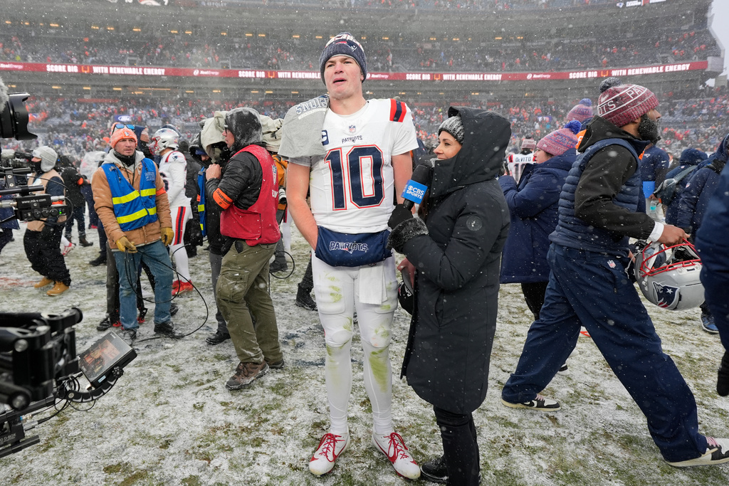 New England Patriots quarterback Drake Maye (10) speaks after the AFC Championship NFL football game against the Denver Broncos, Sunday, Jan. 25, 2026, in Denver. (AP Photo/Ashley Landis)