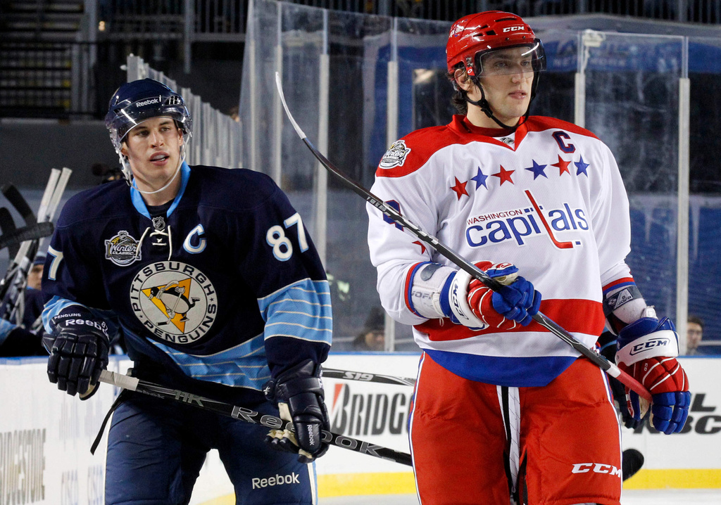 FILE - Washington Capitals' Alex Ovechkin, right, and Pittsburgh Penguins' Sidney Crosby (87) skate during the second period of the NHL Winter Classic outdoor hockey game in Pittsburgh Saturday, Jan. 1, 2011. (AP Photo/Gene J. Puskar, File)