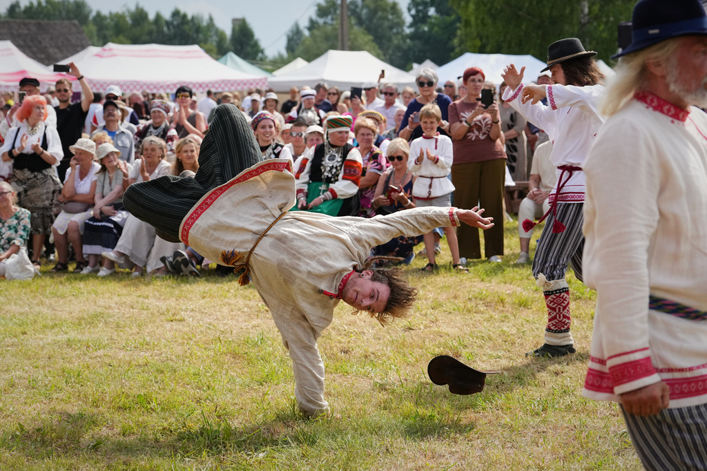 Estonia Seto Kingdom Day Men wearing traditional Seto costumes dance during the annual Seto Kingdom Day in Mikitamäe, south Estonia, Saturday, Aug. 1, 2026. (AP Photo/Sergei Grits)
