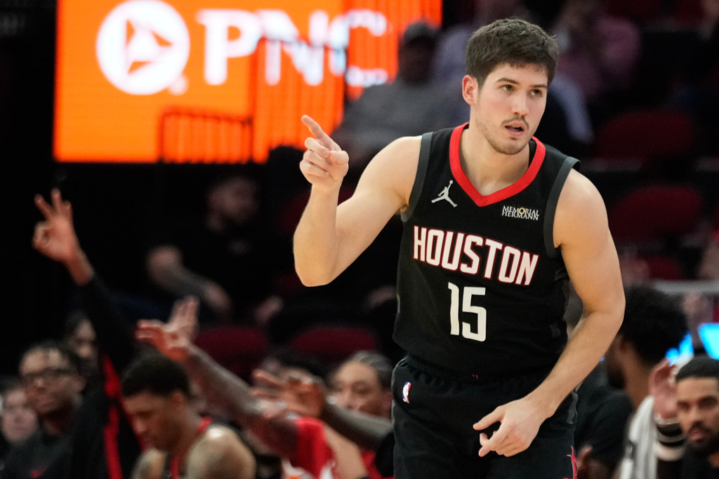 Houston Rockets guard Reed Sheppard reacts after making a 3-point basket against the Sacramento Kings during the first half of an NBA basketball game, Wednesday, Feb. 25, 2026, in Houston. (AP Photo/Eric Christian Smith)