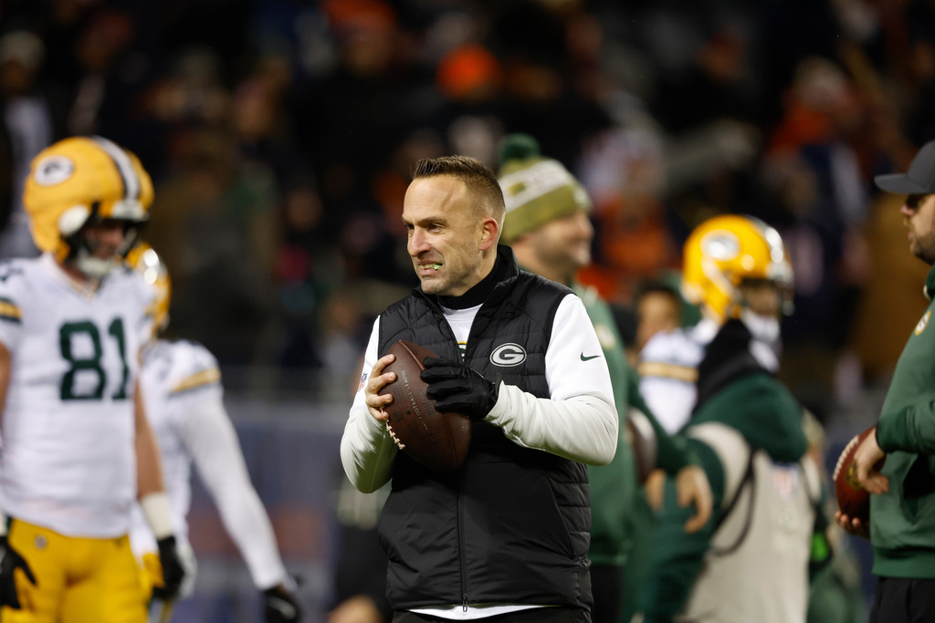 FILE - Green Bay Packers coach Jeff Hafley holds a ball before an NFL wild-card football game against the Chicago Bears, Saturday, Jan. 10, 2026, in Chicago. (AP Photo/Jeffrey Phelps, File)