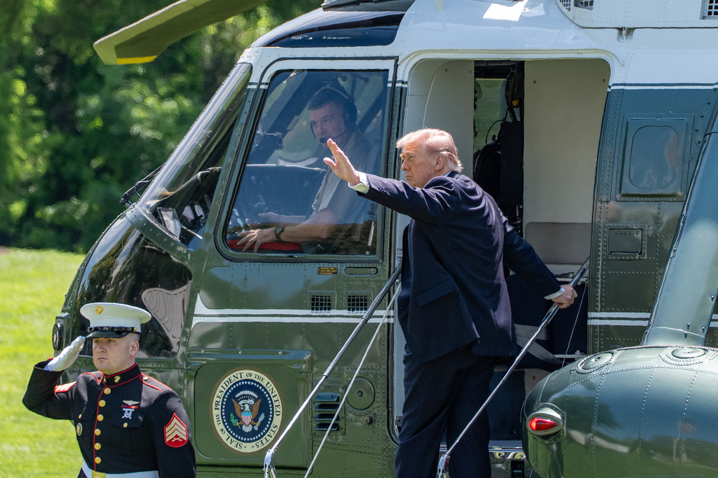 President Donald Trump waves before departing on Marine One from the South Lawn of the White House, Friday, May 1, 2026, in Washington. (AP Photo/Alex Brandon)