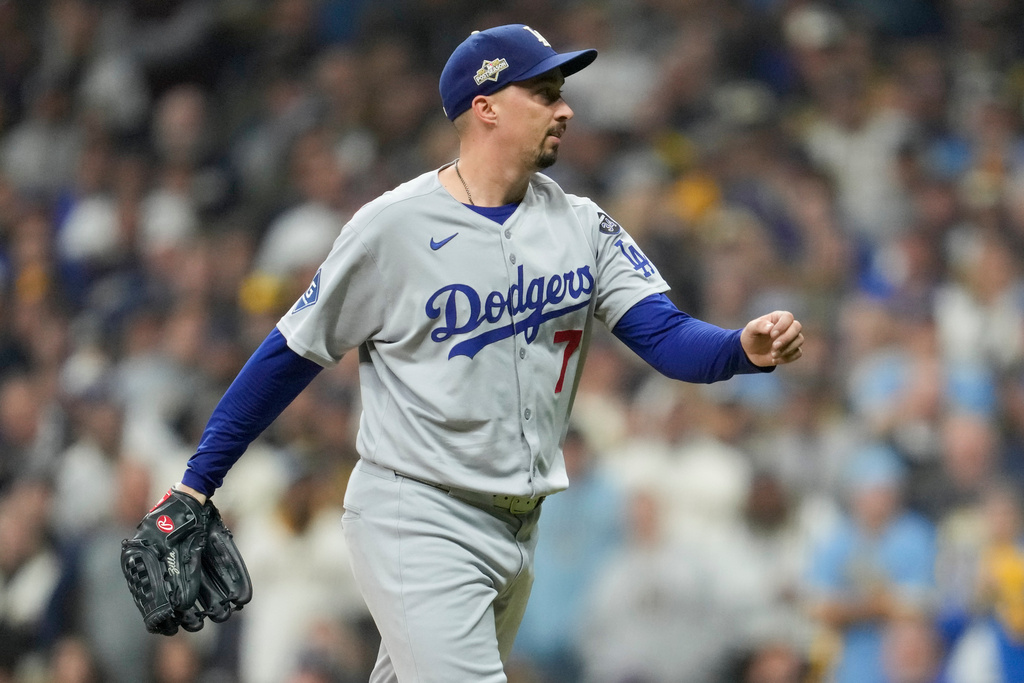 Los Angeles Dodgers pitcher Blake Snell celebrates the end of the eighth inning against the Milwaukee Brewers in Game 1 of baseball's National League Championship Series, Monday, Oct. 13, 2025, in Milwaukee. (AP Photo/Ashley Landis)