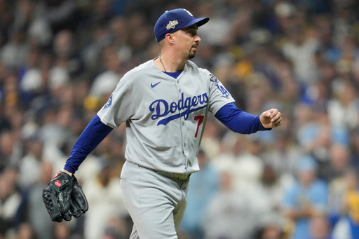 Los Angeles Dodgers pitcher Blake Snell celebrates the end of the eighth inning against the Milwaukee Brewers in Game 1 of baseball's National League Championship Series, Monday, Oct. 13, 2025, in Milwaukee. (AP Photo/Ashley Landis) Los Angeles Dodgers pitcher Blake Snell celebrates the end of the eighth inning against the Milwaukee Brewers in Game 1 of baseball's National League Championship Series, Monday, Oct. 13, 2025, in Milwaukee. (AP Photo/Ashley Landis)