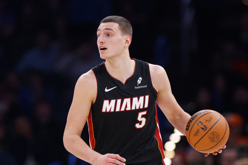 FILE - Miami Heat forward Nikola Jovic dribbles during the first half of an NBA basketball game against the Oklahoma City Thunder, Feb. 12, 2025, in Oklahoma City. (AP Photo/Nate Billings, File)