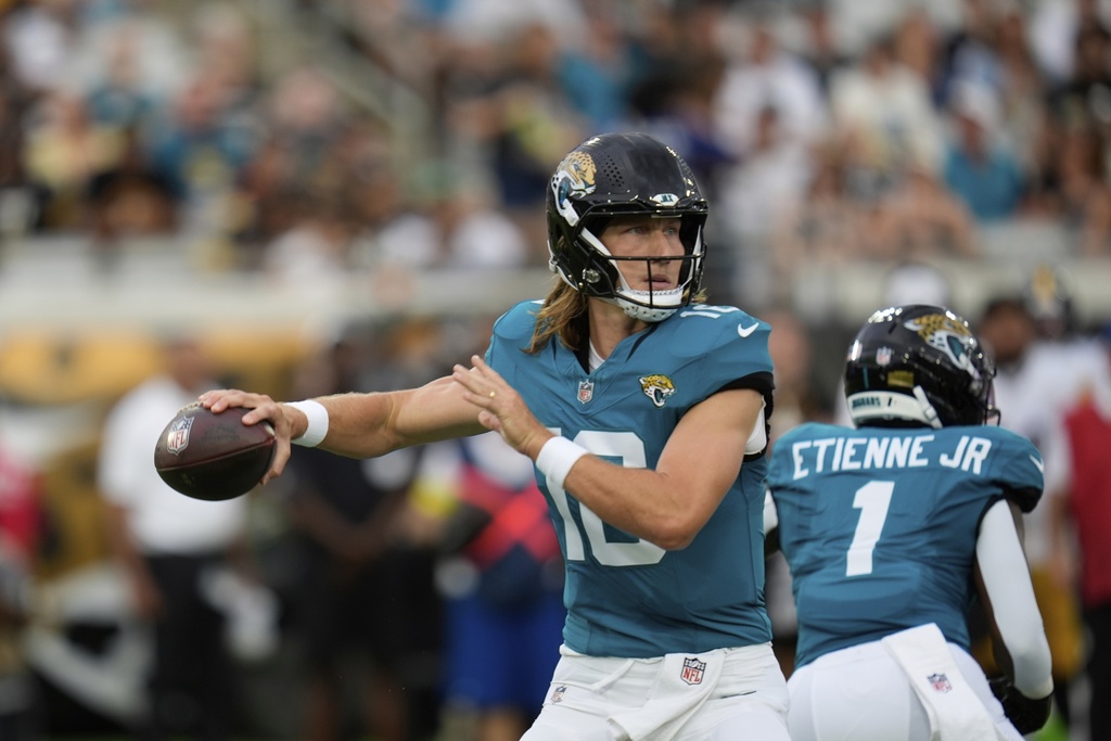 Jacksonville Jaguars quarterback Trevor Lawrence throws during the first half of an NFL preseason football game against the Pittsburgh Steelers, Saturday, Aug. 9, 2025, in Jacksonville, Fla. (AP Photo/John Raoux)